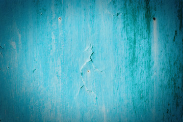 Old cracked painted texture. Rusty blue wood.