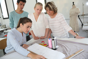 Group of students in dressmaking training school
