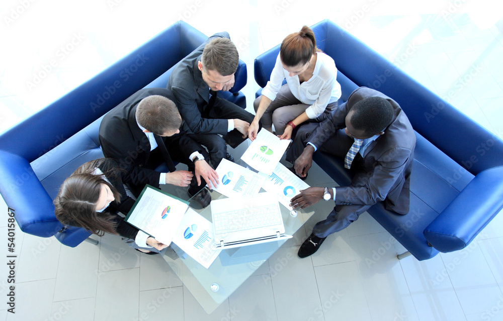 Canvas Prints Top view of working business group sitting at table