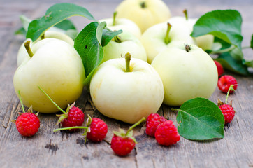 Fresh apples and raspberries