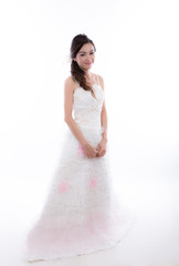 Fototapeta na wymiar Portrait of beautiful bride with wedding dress isolated on white