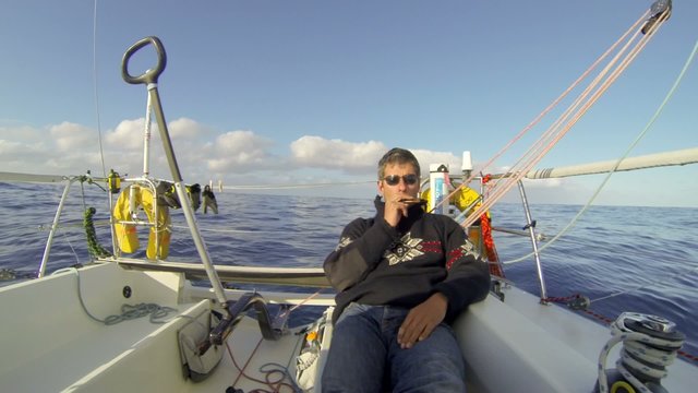 Sailor,  playing a harmonica