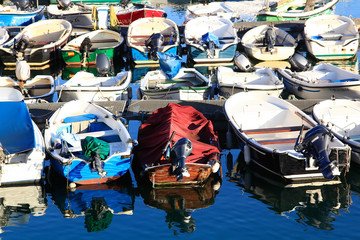 Fototapeta na wymiar many rowing boats and fishing engine nice colors