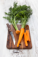 Carrots on a wooden background