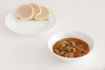 Hungarian goulash with pickled white cabbage and dumplings