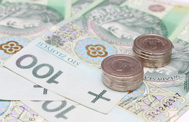 Banknote and stacks of coins