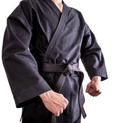 Crédence de cuisine en verre imprimé Arts martiaux Karate fighters in black kimono