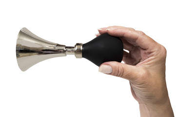 Hand Holding Horn Ready To Toot Isolated