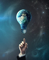 hand pointing at lamp earth