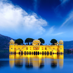 Indian water palace on Jal Mahal lake at night time in Jaipur, I