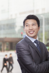 Man in front of Building