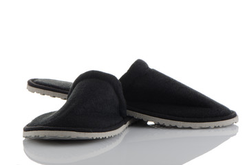 A pair of grey slippers