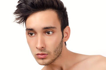 Portrait of a young beautiful man with half face shaved