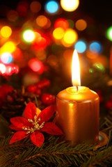 Detail of advent wreath on dark background.