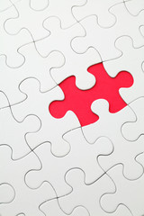 Fototapeta premium Missing puzzle piece in red color