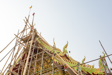 Construction of a temple building in scaffolding