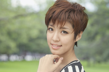 Close up portrait of young woman smiling