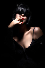 Beautiful Sexy Girl Portrait. Black Hair. Sensual red lips