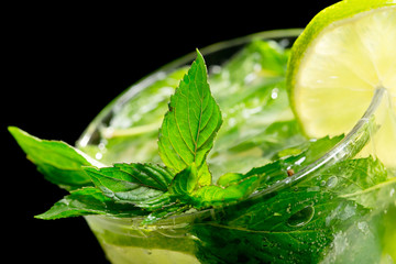 Mojito cocktail on black background