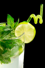 Mojito cocktail on black background