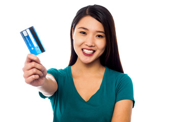 Attractive model displaying her credit card