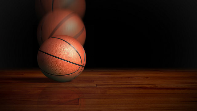 basketball falling on wood floor