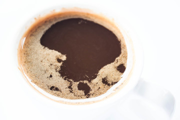 White cup of espresso shot isolated on white background