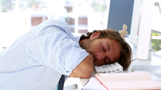 Graphic designer sleeping