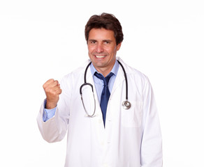 Fototapeta premium Positive medical doctor standing in white uniform