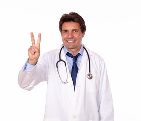 Handsome medical doctor showing you victory sign