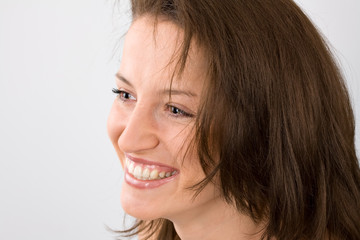 Smiling Girl on grey background