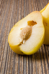 Half of yellow plums