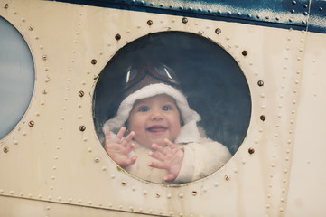 little baby dreaming of being pilot