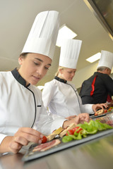 Young people in cooking training class