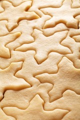 Pastry for Christmas cookies and snowflake shapes.