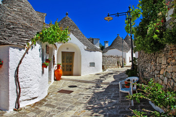 Unique Trulli houses with conical roofs in Alberobello, Italy, P