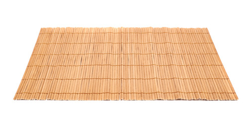 Bamboo straw serving mat isolated