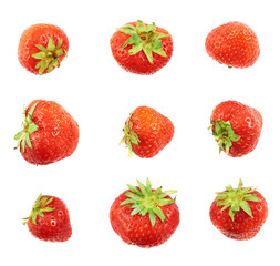 Single red strawberries isolated