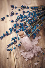 Obraz na płótnie Canvas Bottle with sea salt and lavender