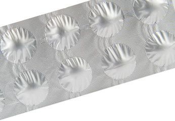 Closed up medicine tablet in aluminum foil strip