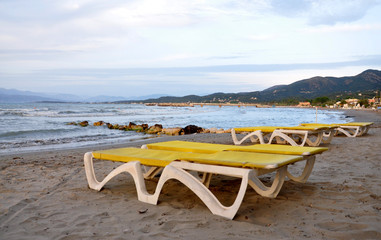 abandoned beach chairs