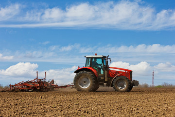 Farmer plowing the field