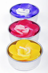 Three Rose Scented Candles.