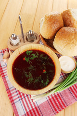 Delicious borsch on table close-up
