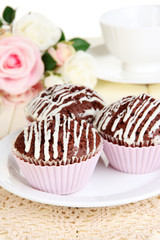 Sweet chocolate cupcakes close up