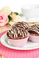 Sweet chocolate cupcakes close up