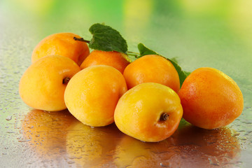 Apricots on nature background