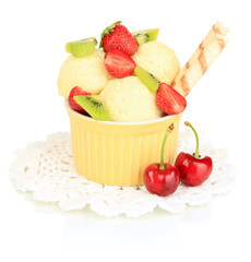 Delicious  ice cream with fruits and berries in bowl isolated