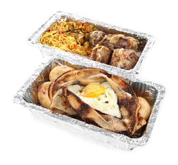 Food in boxes of foil isolated in white