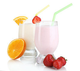 Delicious milk shakes with orange and strawberries isolated